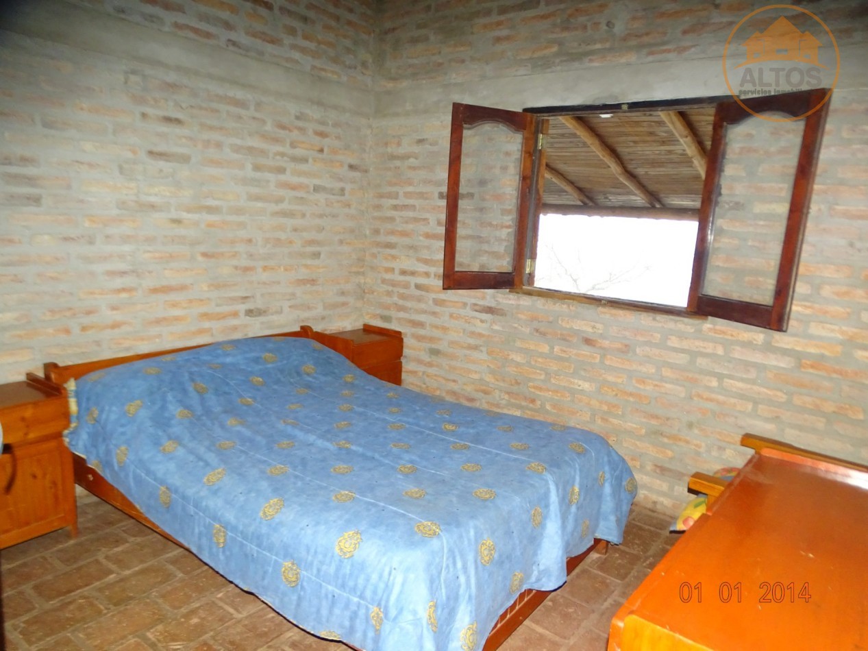 POTRERO DE GARAY-CASA ESQUINA DE DOS DORMITORIOS CON PILETA-TERRENO 1035M2-CORDOBA-ESCRITURA