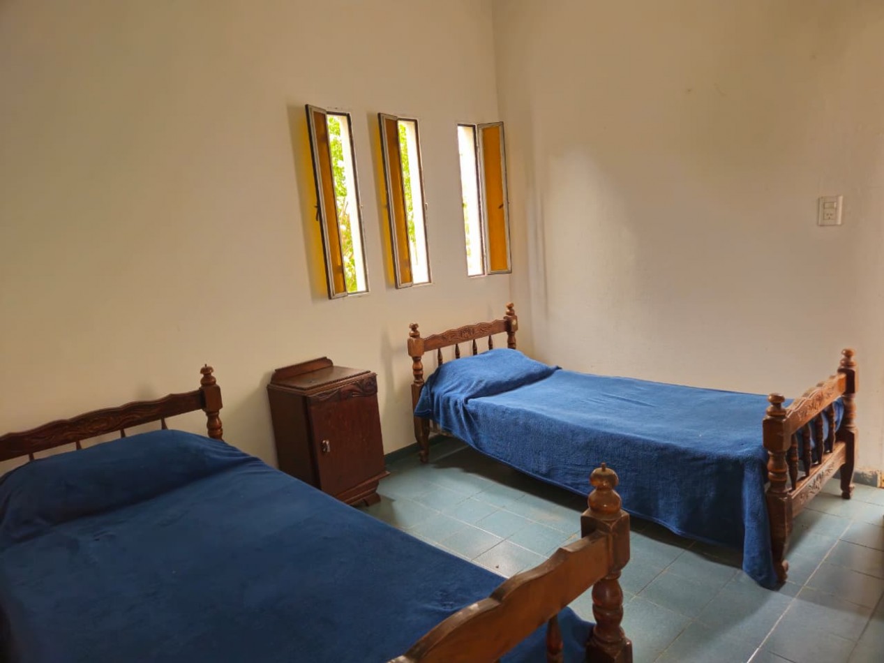 BARRIO LOS TALAS-SAN ISIDRO EN VILLA ANISACATE-CASA EN PLANTA BAJA ESQUINA, QUINCHO EN TERRENO DE 1.800m2 -CORDOBA-ESCRITURA