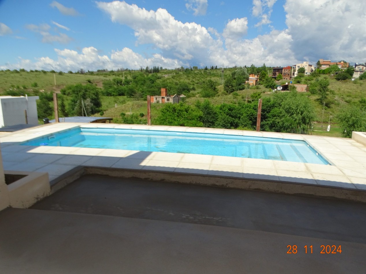 POTRERO DE GARAY-CASA MUY LUMINOSA Y AMPLIA A ESTRENAR-TERRENO 1.224M2-DOS DORMITORIOS-TRES BAÑOS-GALERIA-QUINCHO-PILETA-CORDOBA-ESCRITURA