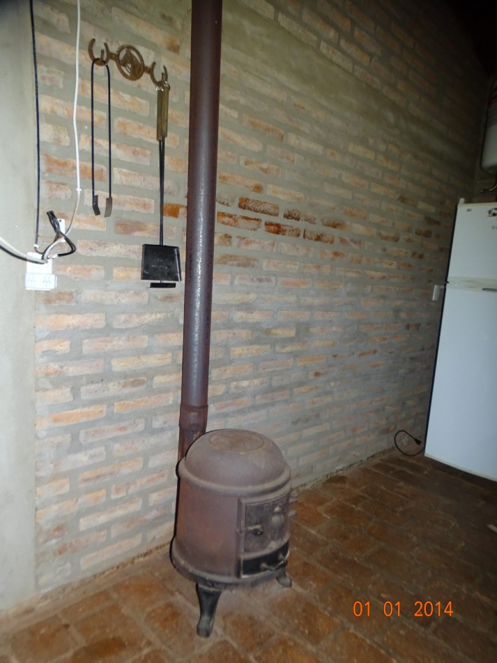 POTRERO DE GARAY-CASA ESQUINA DE DOS DORMITORIOS CON PILETA-TERRENO 1035M2-CORDOBA-ESCRITURA